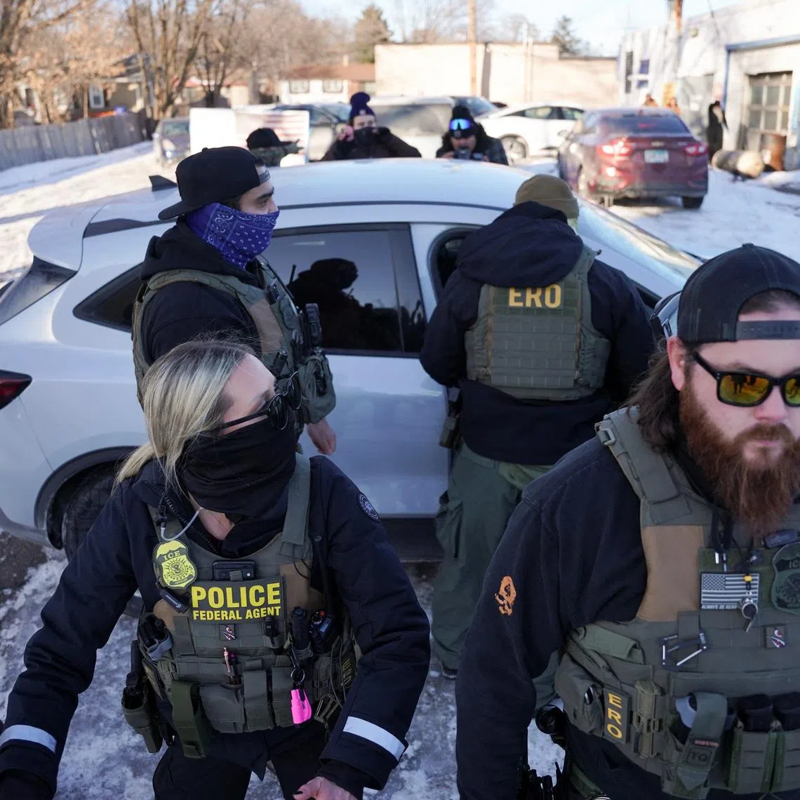 Federal agents conduct immigration enforcement action in Saint Paul, Minnesota, U.S., January 27, 2026. REUTERS/Seth Herald