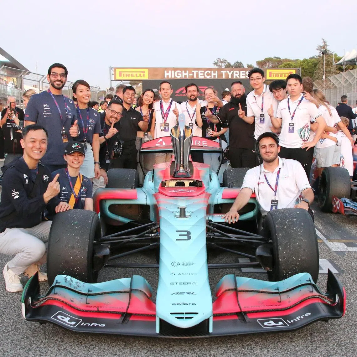 Team Kinetiz with their autonomous race car after placing first in the Abu Dhabi Autonomous Racing League’s race at Italy’s Imola Circuit on Sept 5.