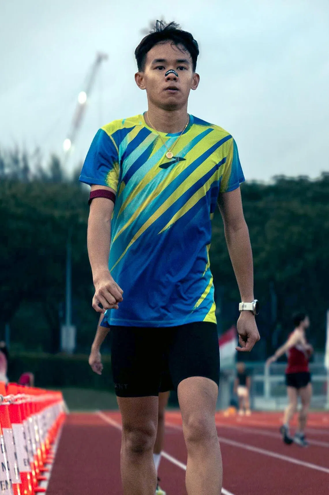 Keane Ko notes that his move to Slovenia has improved his performance as a runner.