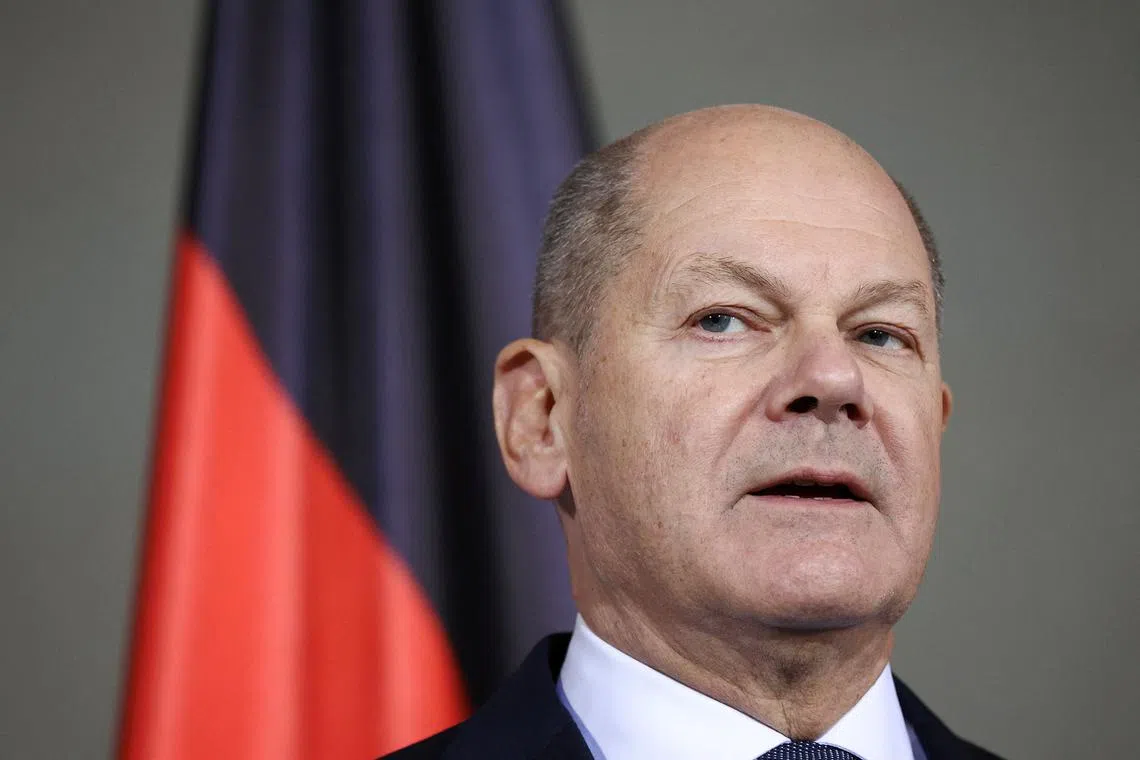 FILE PHOTO: German Chancellor Olaf Scholz speaks to reporters, after a December 16 confidence vote request was submitted, in Berlin, Germany December 11, 2024. REUTERS/Liesa Johannssen/File Photo