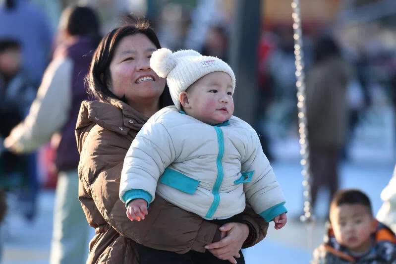 China is throwing money at encouraging more births but money alone may not be enough to persuade parents to go beyond one bouncing bundle of joy. 