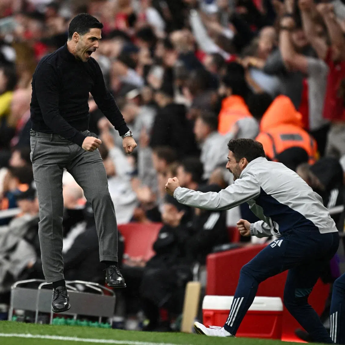 Arsenal manager Mikel Arteta celebrates their second goal, scored by Bukayo Saka.