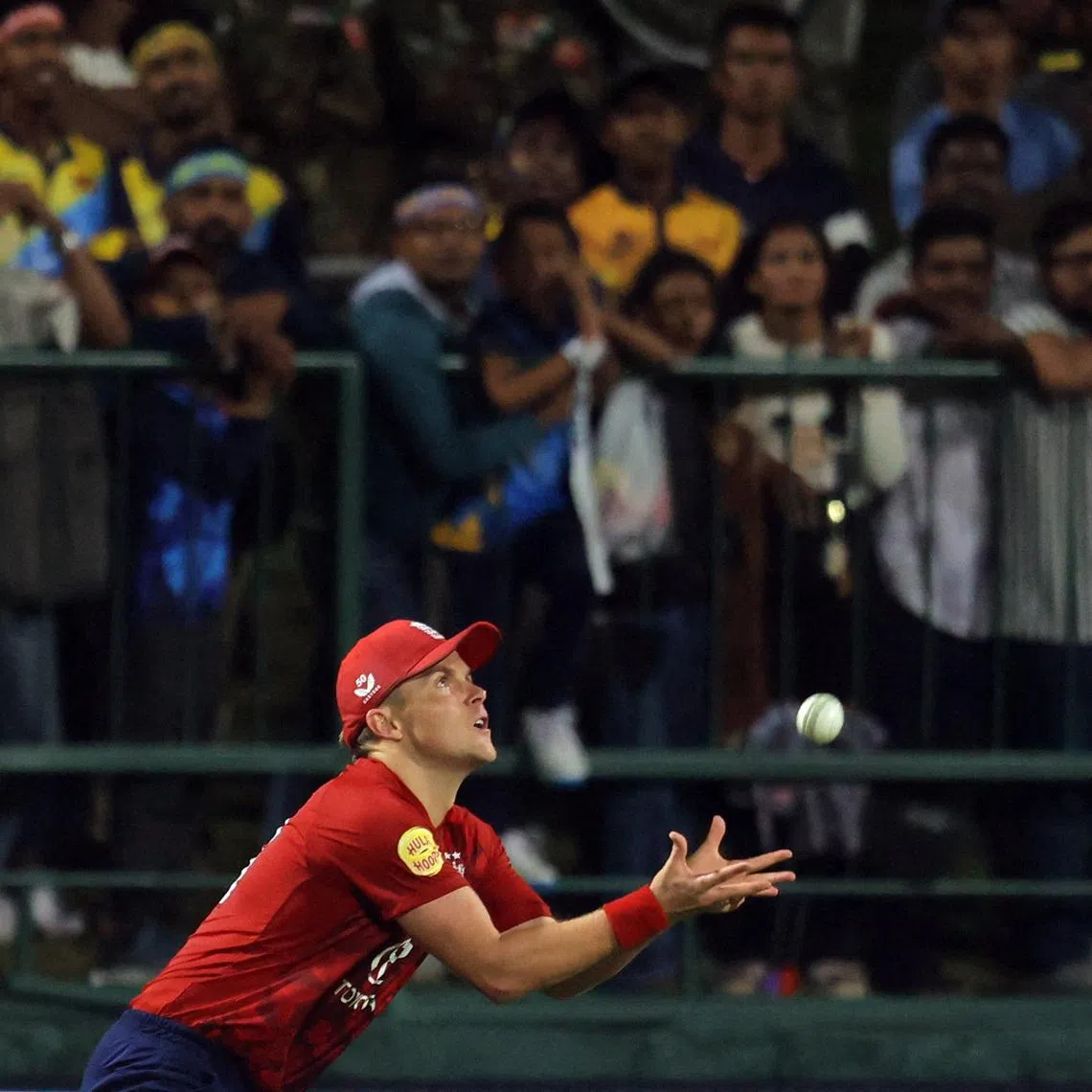 Cricket - Sri Lanka v England - Pallekele International Cricket Stadium, Pallekele, Sri Lanka - January 30, 2026 England's Sam Curran catches out Sri Lanka's Dhananjaya de Silva REUTERS/Lahiru Harshana