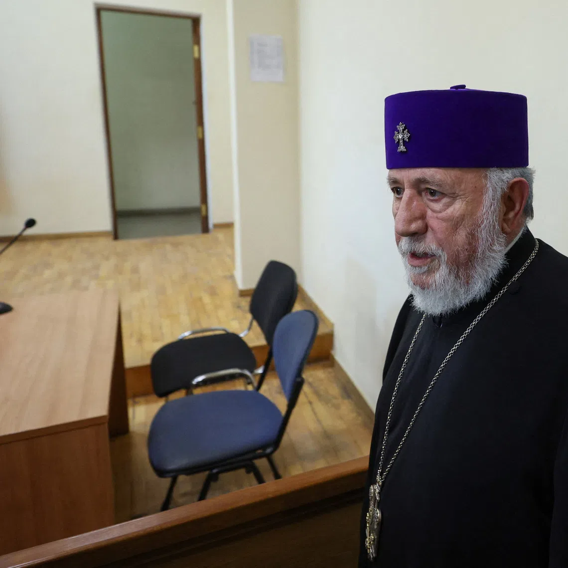 Armenia's chief bishop Catholicos Karekin II, who is accused of allegedly failing to comply with a civil court order temporarily reinstating a bishop whom the Armenian Apostolic Church defrocked, attends a court hearing in Vagharshapat, Armenia, August 7, 2026. Vahram Baghdasaryan/Photolure via REUTERS