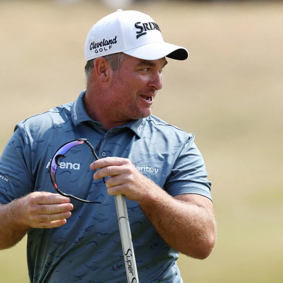 Golf - The 154th Open Championship - Royal Birkdale Golf Club, Southport, Britain - July 18, 2026 New Zealand's Ryan Fox celebrates on the green of the 18th hole after shooting 62 during the third round REUTERS/Russell Cheyne