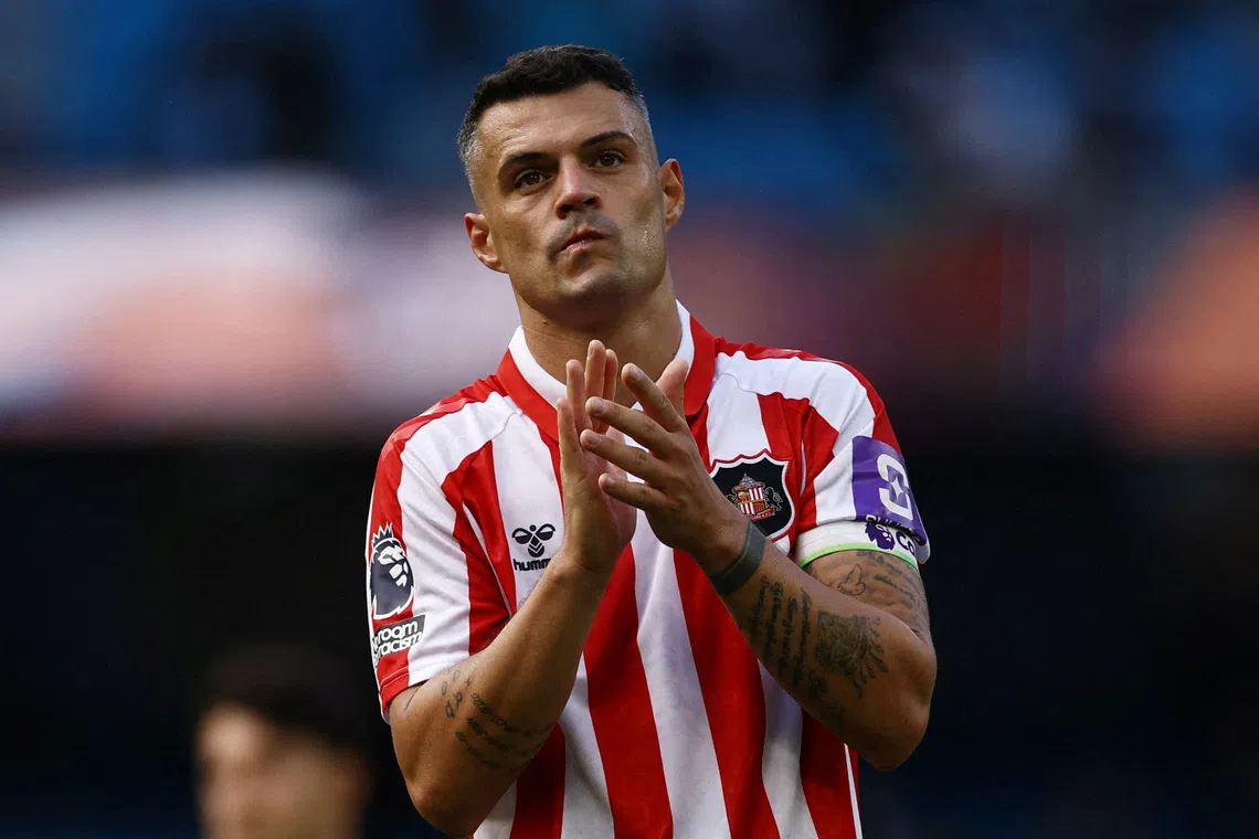 FILE PHOTO: Soccer Football - Premier League - Manchester City v Sunderland - Etihad Stadium, Manchester, Britain - September 20, 2026 Sunderland's Granit Xhaka applauds fans after the match Action Images via Reuters/Lee Smith/File Photo