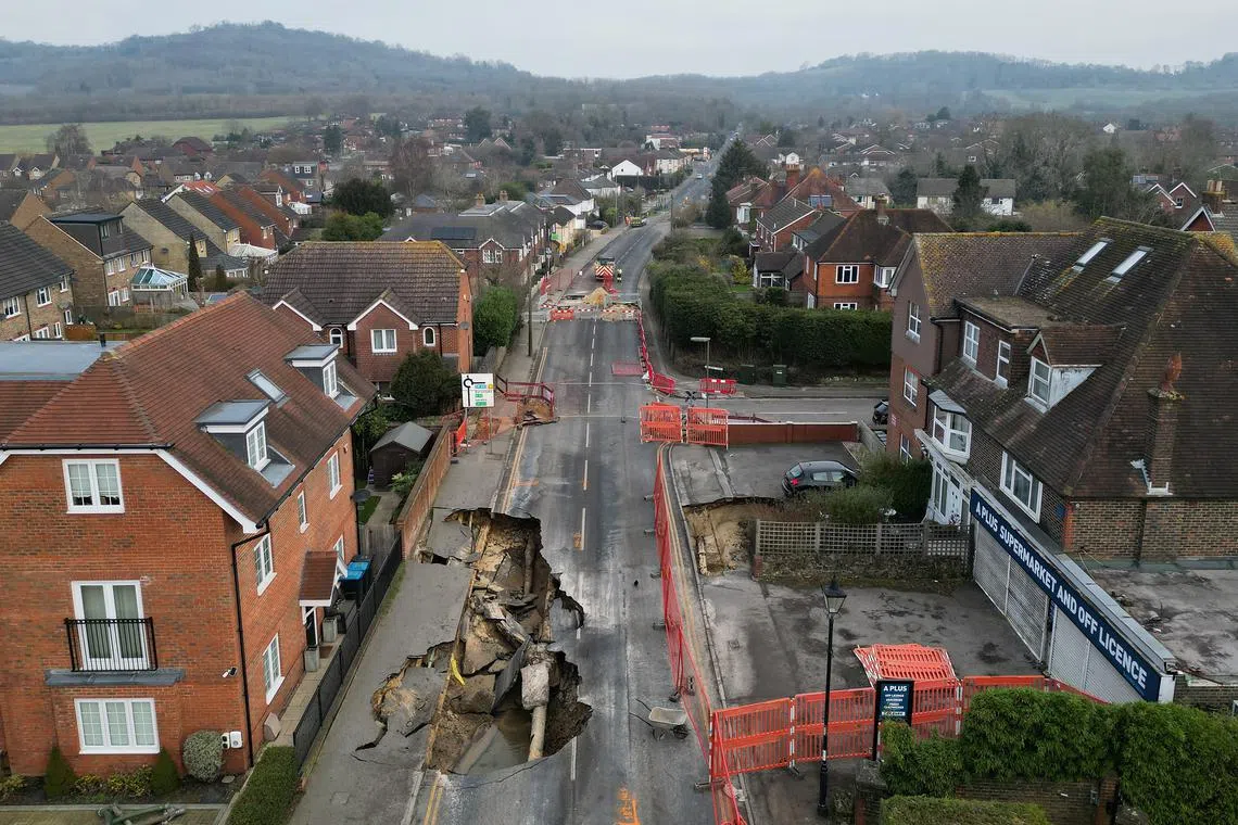 A drone view shows a large sinkhole in Godstone, southern Britain, February 19, 2025. REUTERS/Toby Melville