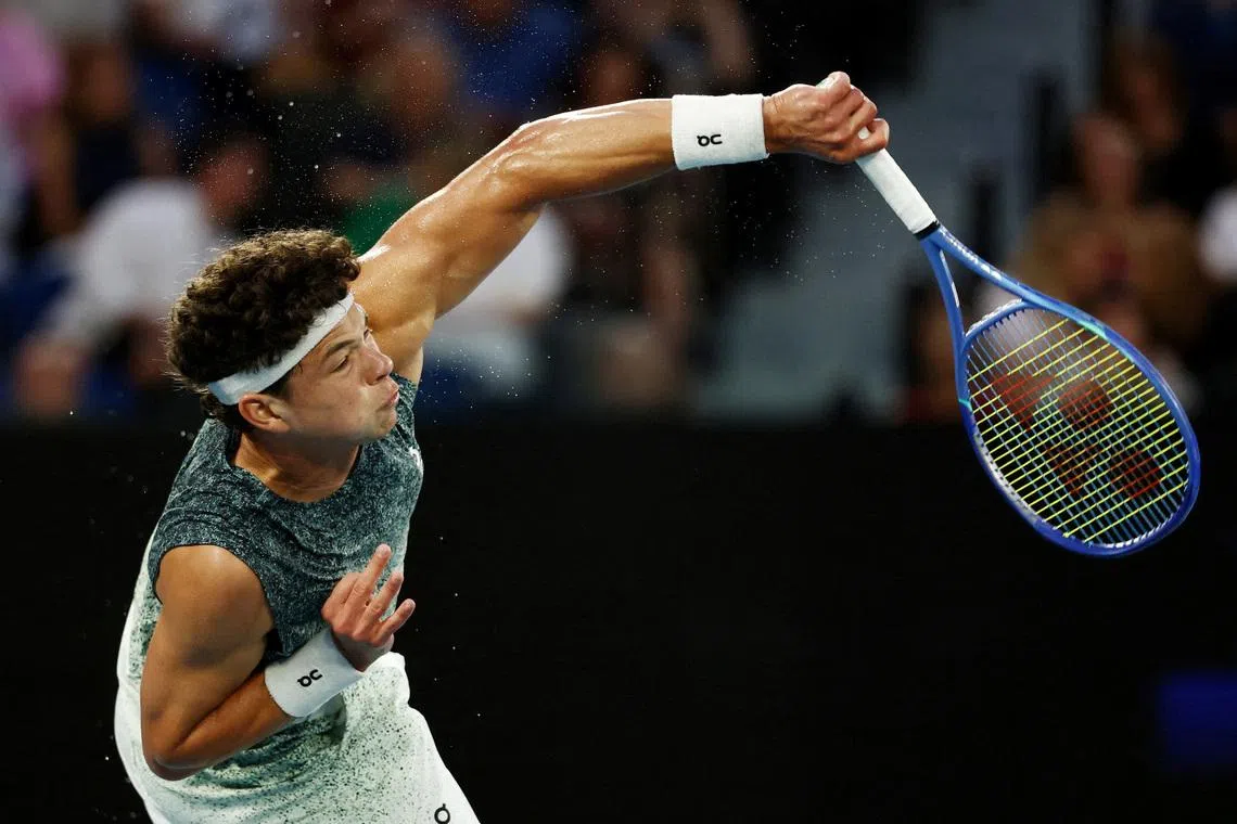 Tennis - Australian Open - Melbourne Park, Melbourne, Australia - January 28, 2026 Ben Shelton of the U.S. in action during his quarter final match against Italy's Jannik Sinner REUTERS/Tingshu Wang