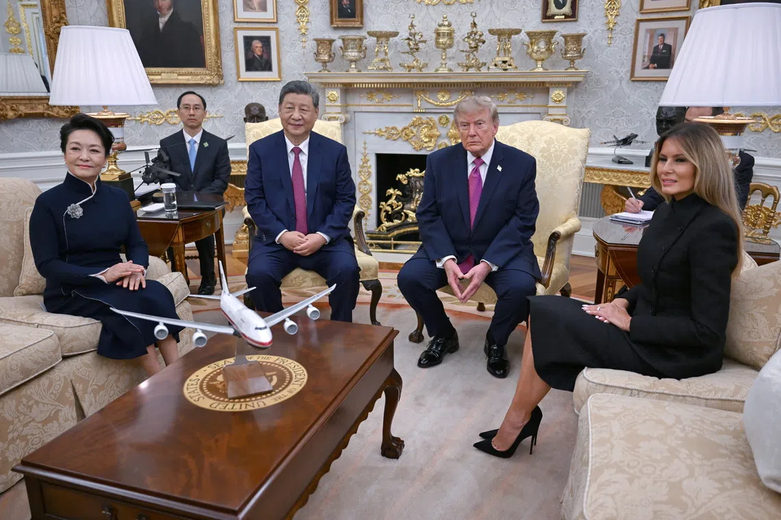 US President Donald Trump, first lady Melania Trump (right), Chinese President Xi Jinping and first lady Peng Liyuan (left) at the Oval Office on Sept 24.