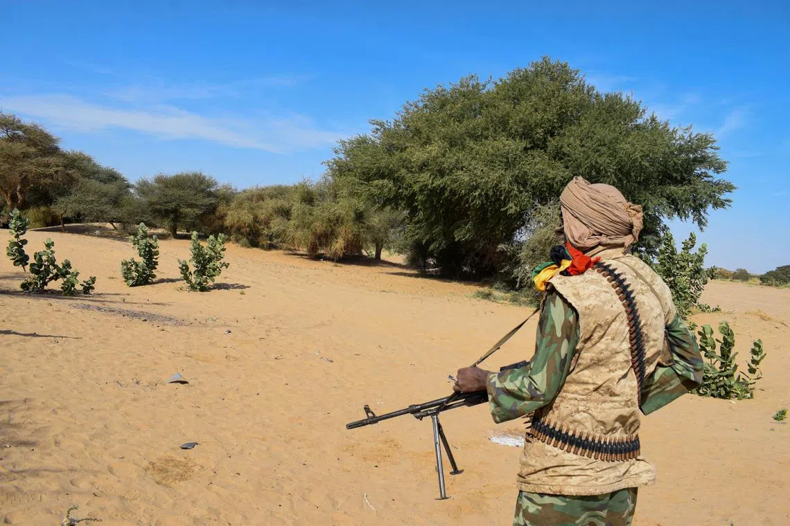 A CSP-DPA fighter secures the perimeter during a meeting of Tuareg rebels army leaders in Tinzaouaten, Mali November 27, 2024. REUTERS/Abdolah Ag Mohamed/File Photo