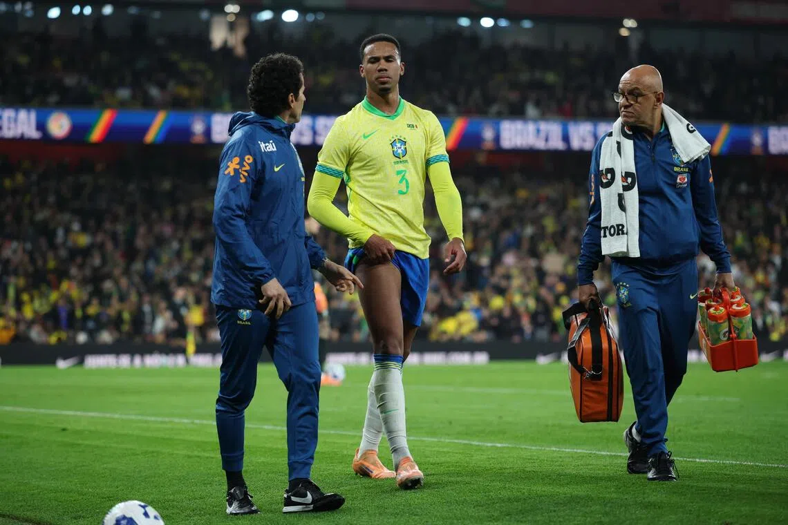 Brazil's Gabriel Magalhaes walking off after being substituted due to an injury in the international friendly against Senegal at the Emirates Stadium in London on Nov 15, 2025.