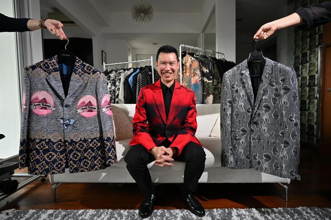 ST20240109-202479301981-Lim Yaohui-Amanda Chai-acveste/
Prof David Tan, 54, Law professor and fashion collector, with his luxury couture jackets at home on Jan 9, 2024.
Law professor and fashion collector David Tan is exhibiting 42 luxury couture jackets from his 200+ strong collection in La Veste, an upcoming fashion showcase by Alliance Francaise.
(ST PHOTO: LIM YAOHUI)