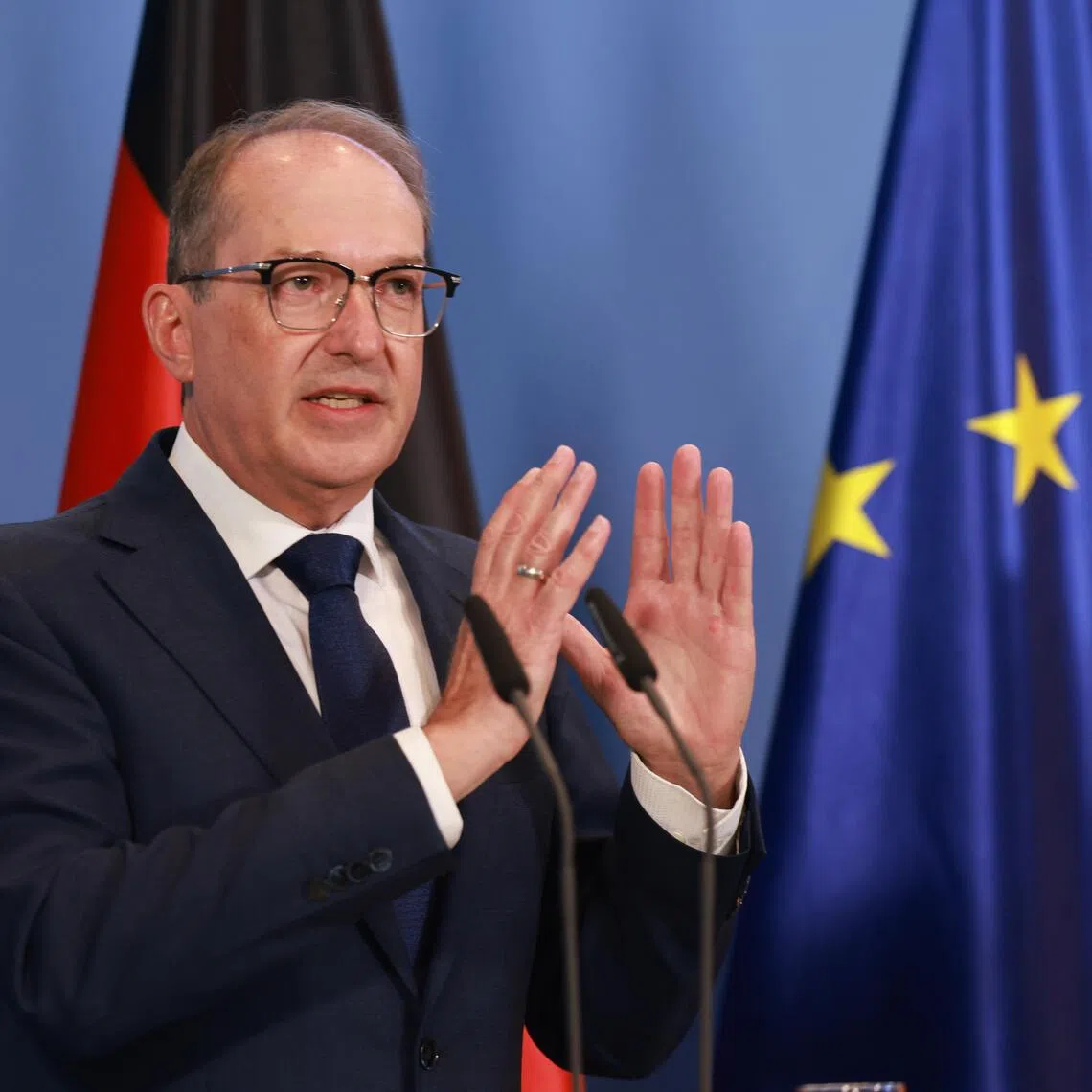 German Interior Minister Alexander Dobrindt attending a press conference following the weekly cabinet meeting on the reform of intelligence agency legislation, in Berlin on Aug 12.