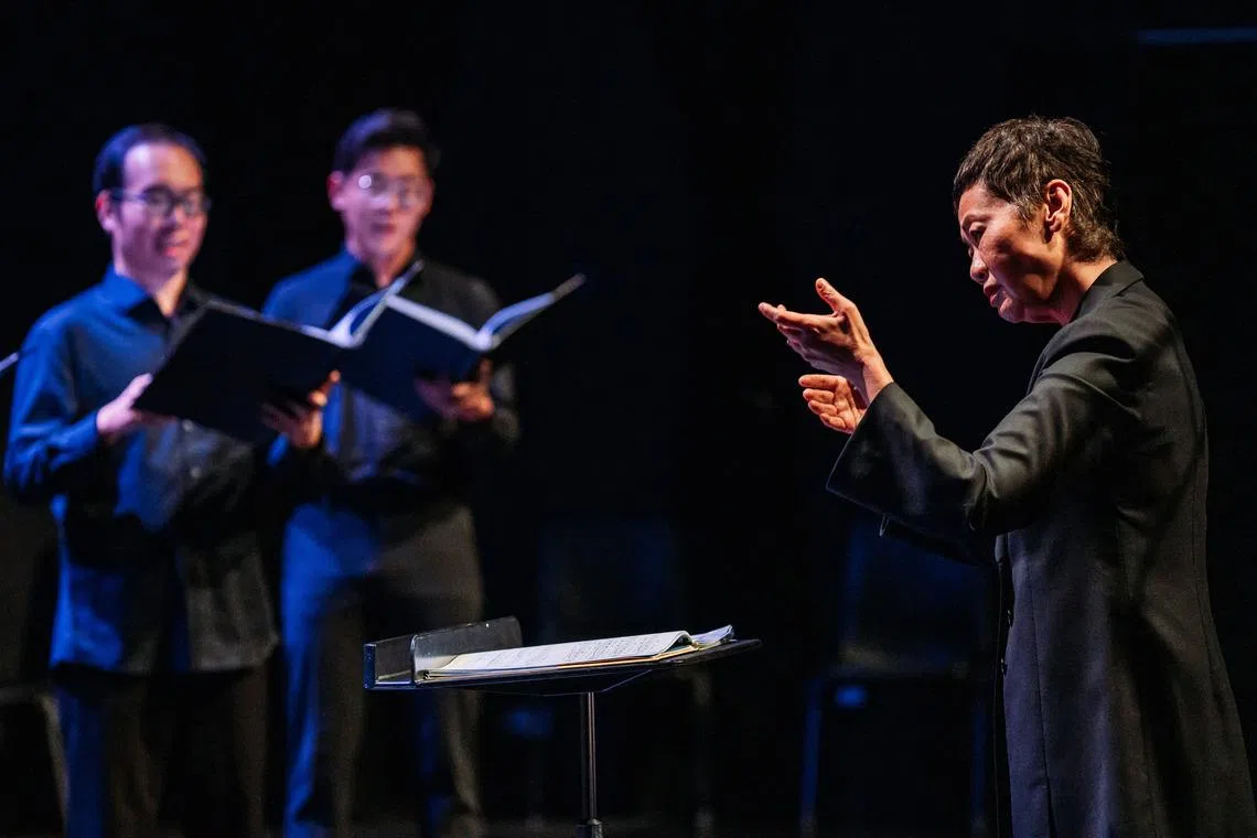 Cultural Medallion recipient Jennifer Tham leads the SYC Ensemble Singers.