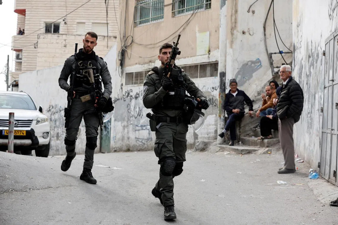 Israeli border police outside the house of Palestinian gunman Khaire Alkam in East Jerusalem on Saturday.