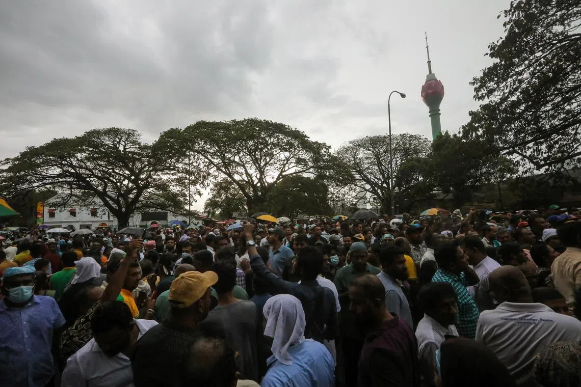 Sri Lankan main opposition party supporters at an anti-government protest march demanding elections in Colombo, on Feb 20.