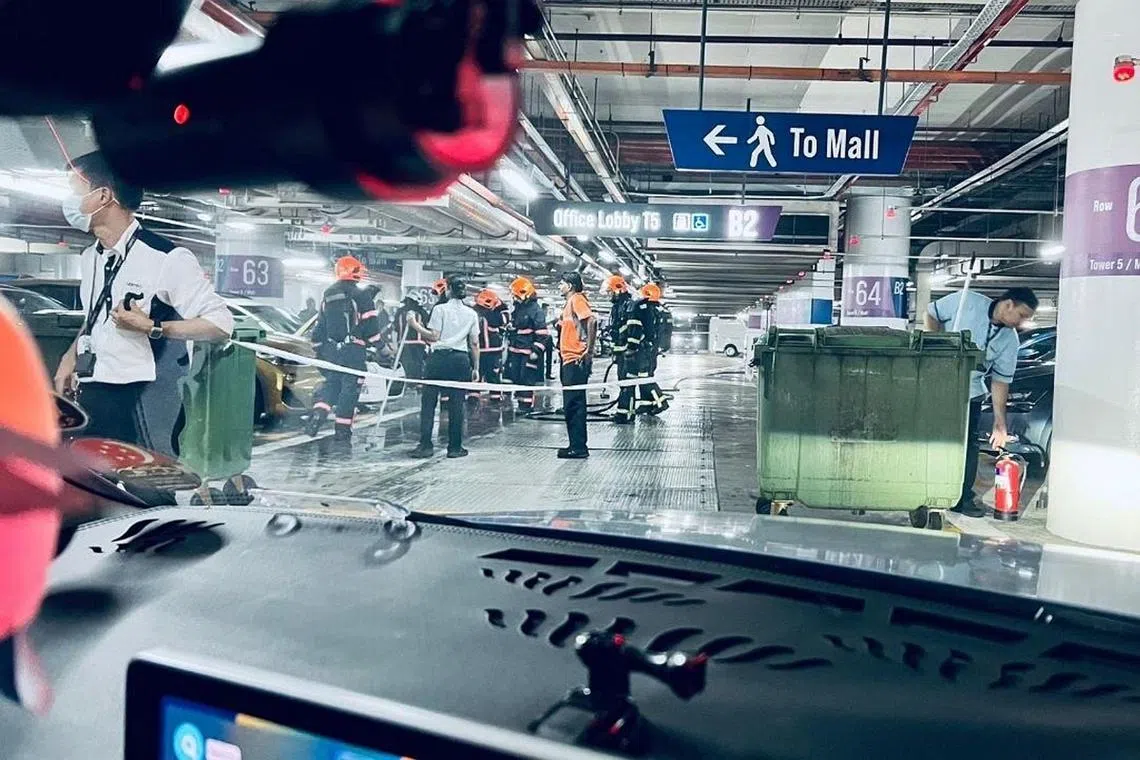 SCDF personnel seen in the basement carpark of Suntec City on March 10, 2023.