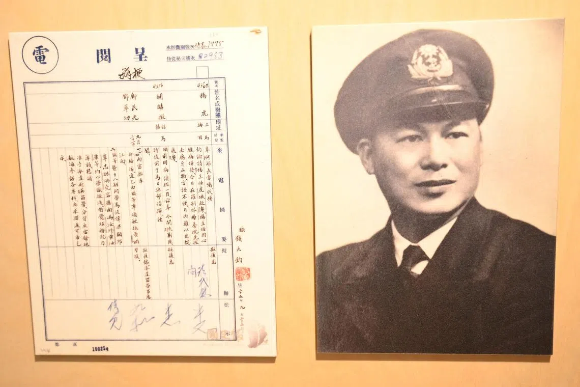 A portrait of Lam Ping-yu, a Chinese naval officer who served on board the British warship HMS Ramillies during World War II, is seen with other documents during the "Lost and Found in Hong Kong: The Unsung Chinese Heroes at D-Day" exhibition at The Fringe Club in Hong Kong on September 10, 2024. The night before June 6, 1944, fleets of warships moved in darkness towards the beaches of Normandy, France, for a massive strike, with Chinese naval officer Lam Ping-yu on one of the vessels. Lam's 80-page journal is the centrepiece of a Hong Kong exhibition launching this month, which for the first time chronicles the stories of 24 Chinese officers who helped Allied forces in their landmark D-Day operation. (Photo by Peter PARKS / AFP) / To go with AFP story Hong Kong-China-history-military-D-Day, FOCUS by Xinqi Su