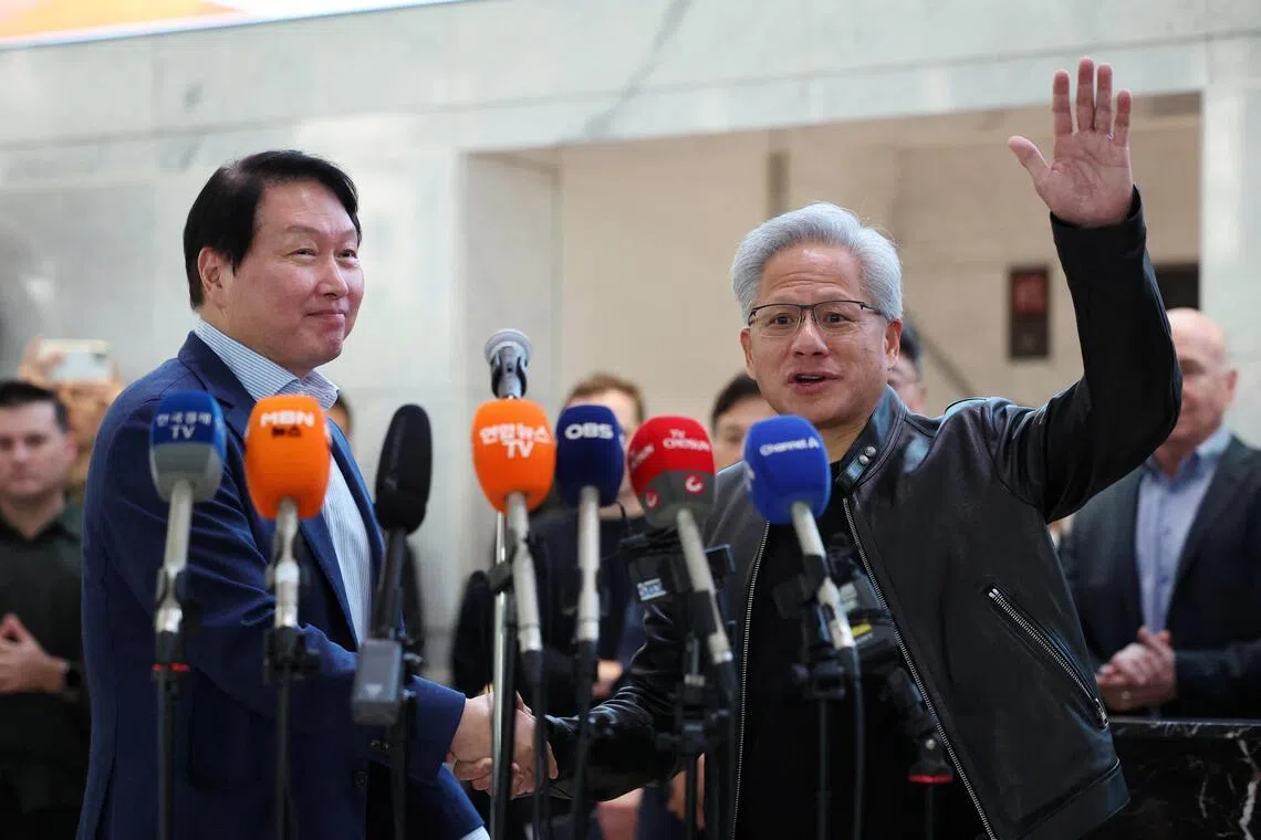 Nvidia CEO Jensen Huang and SK Group chairman Chey Tae-won at a media briefing on June 8.