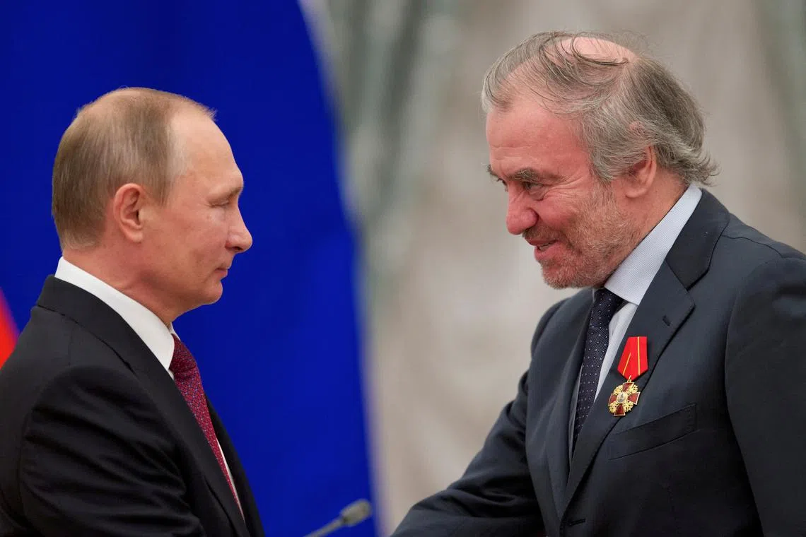 FILE PHOTO: Russian President Vladimir Putin (L) awards Mariinsky Theatre's Artistic Director Valery Gergiev during a ceremony at the Kremlin in Moscow, Russia, September 22, 2016. REUTERS/Ivan Sekretarev/Pool/File Photo