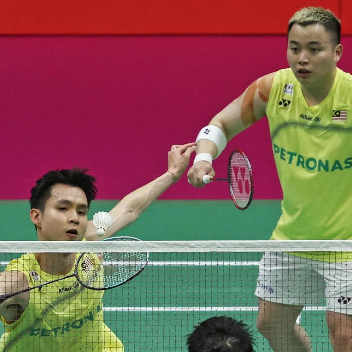 Soh Wooi Yik (left) and Aaron Chia during their doubles final against Liang Wei Keng and Wang Chang of China at the BWF World Championship in New Delhi, India on Aug 23.