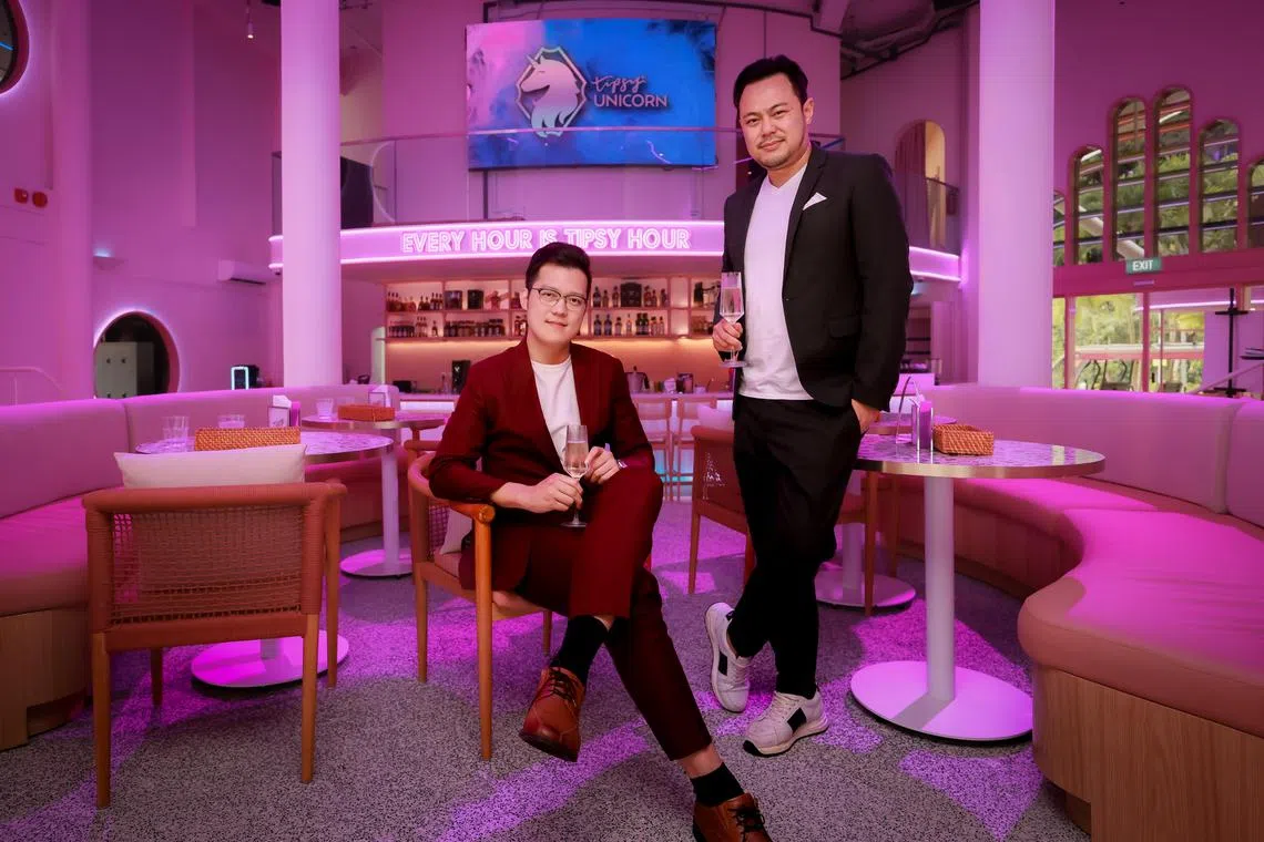 Tipsy Collective's co-founder David Gan (maroon) and the company's CEO Alex Phua (black) at their newest venue Tipsy Unicorn at Sentosa’s TV Siloso Beach, Sep 22, 2023.