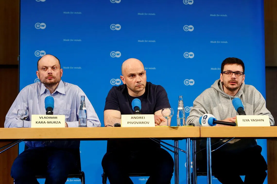 Russian dissidents Ilya Yashin, Vladimir Kara-Murza and Andrei Pivovarov hold a press conference after being freed in a multi-country prisoner swap in Bonn, Germany, August 2, 2024. REUTERS/Leon Kuegeler