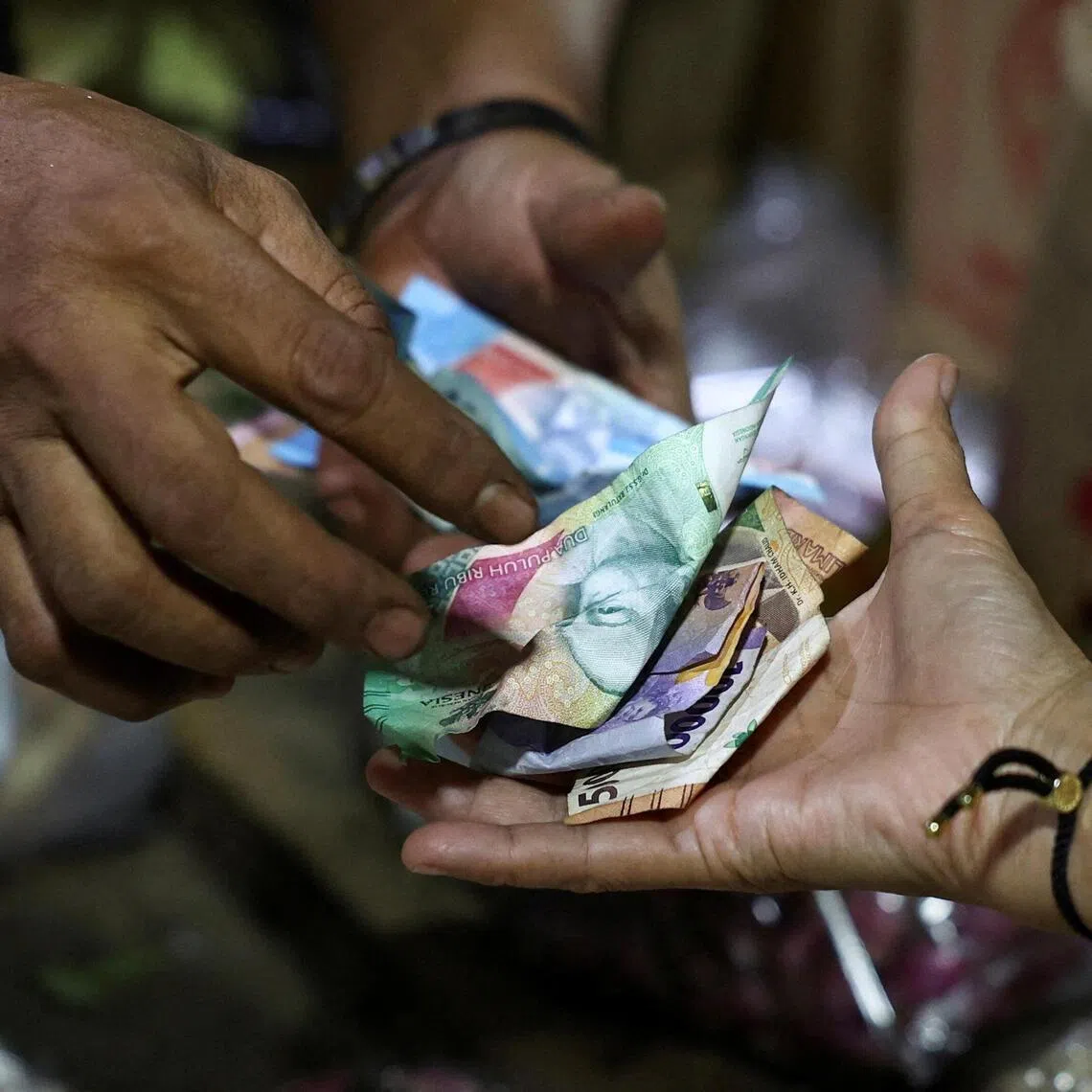 The rupiah, which sank to an all-time low of about 14,135 per Singdollar on June 9, strengthened to around 13,950 per Singdollar on June 11.