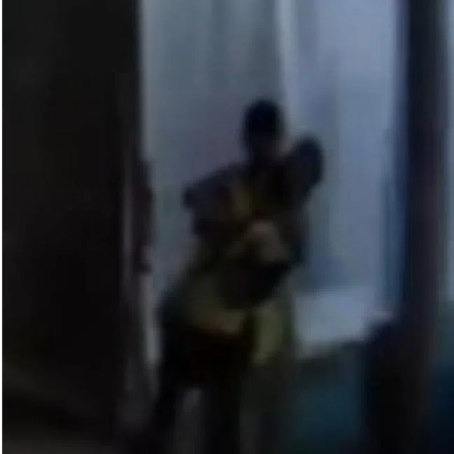 In dashcam footage, a man is seen walking up to an auxiliary police officer with what looks like a pointed object, before placing the officer in a chokehold.