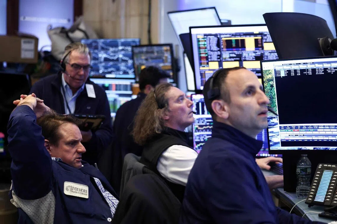 Traders working on the floor of the New York Stock Exchange, in New York City, on April 8.