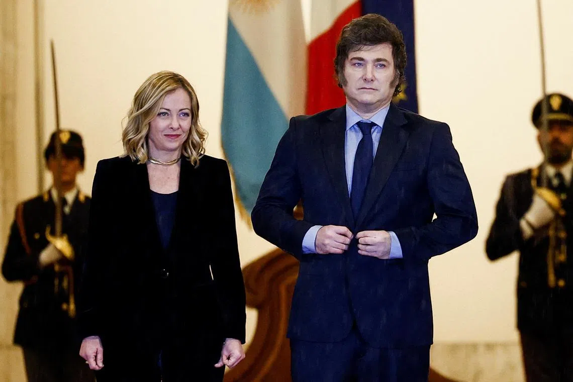 Italian Prime Minister Giorgia Meloni and Argentina's President Javier Milei meet at Chigi Palace, in Rome, Italy, December 13, 2024. REUTERS/Guglielmo Mangiapane