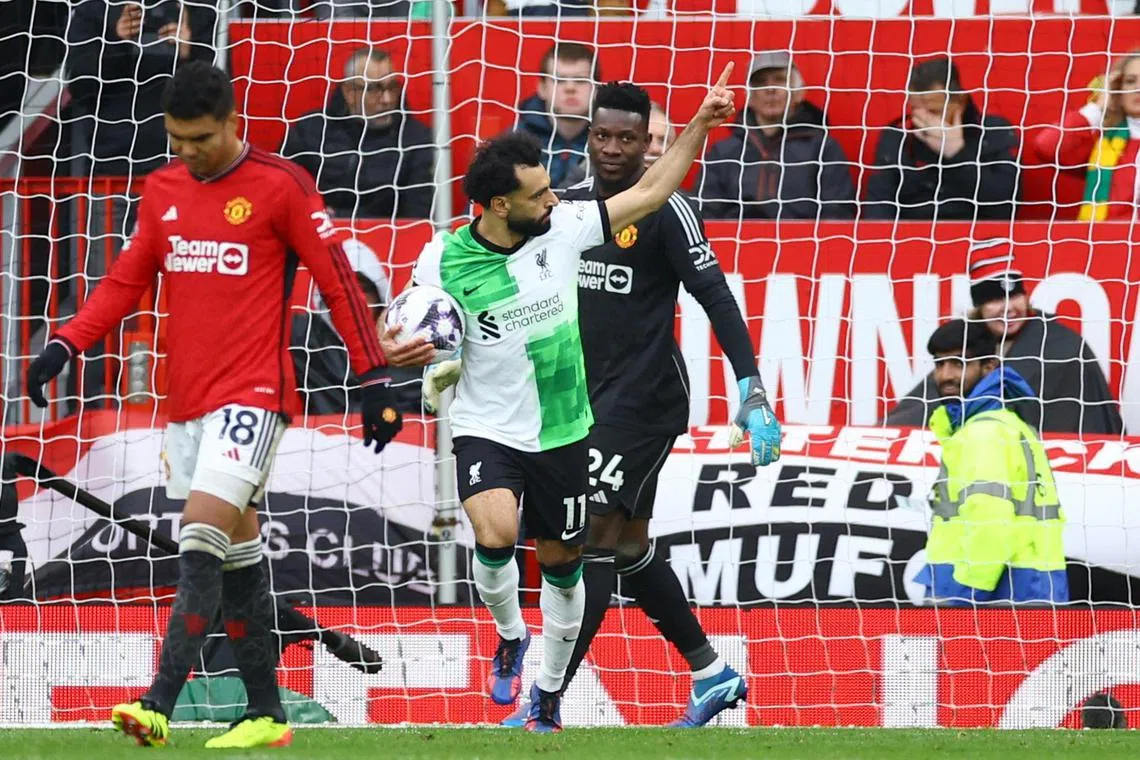 Liverpool's Mohamed Salah celebrating his equaliser from the penalty spot during the 2-2 English Premier League draw with Manchester United at Old Trafford on April 7.