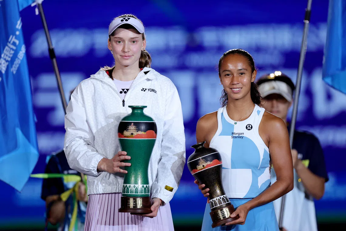 Kazakhstan’s Elena Rybakina celebrates with the Ningbo Open trophy after beating Canada’s Leylah Fernandez in the final on Oct 25.