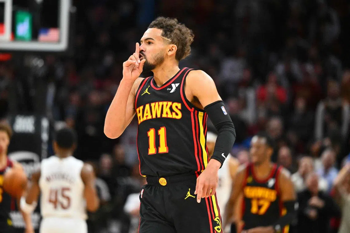Atlanta Hawks star Trae Young silences the crowd after a career-high 22 assists in the 135-124 win over the Cleveland Cavaliers.