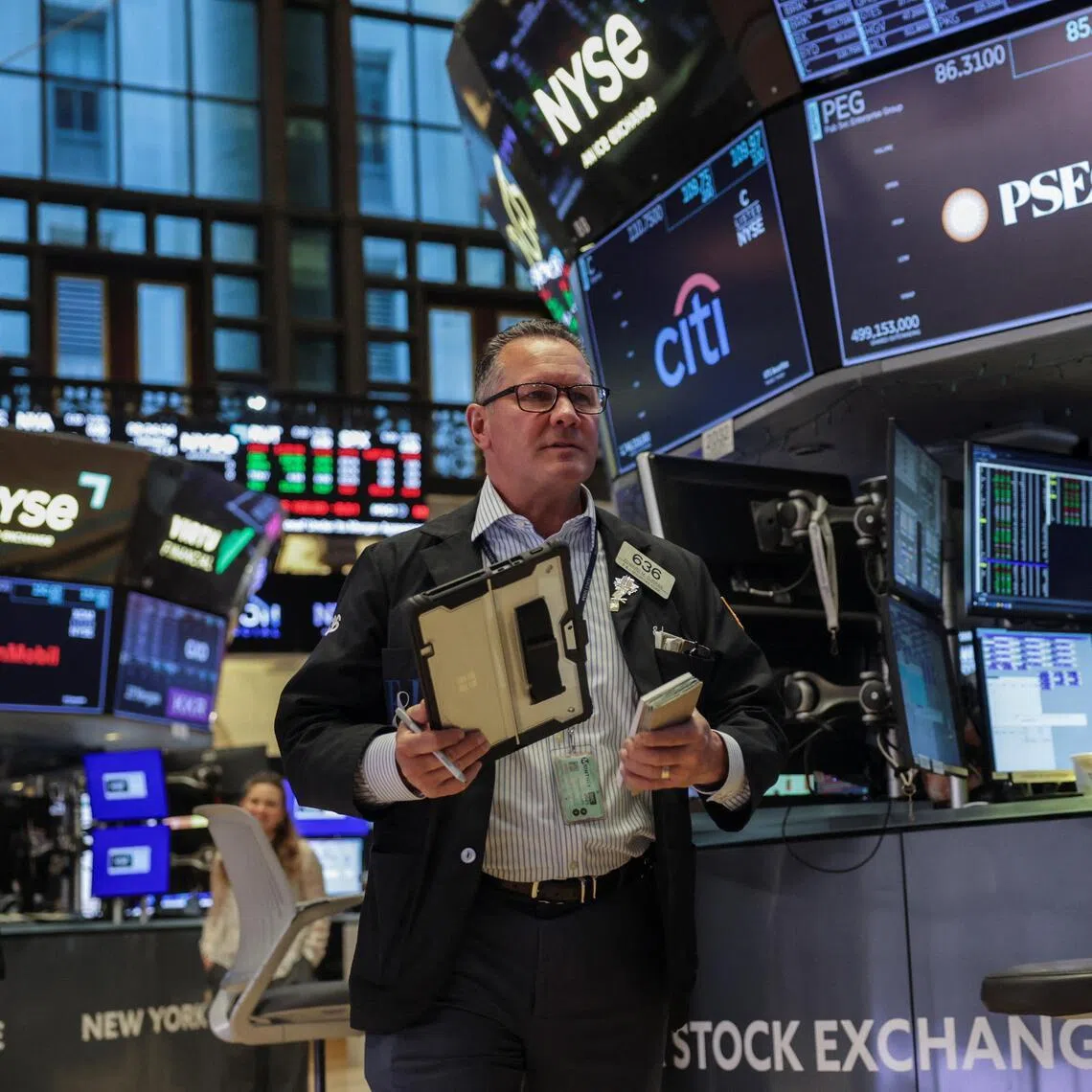 Traders working on the floor of the New York Stock Exchange, in New York City, on Feb 24.