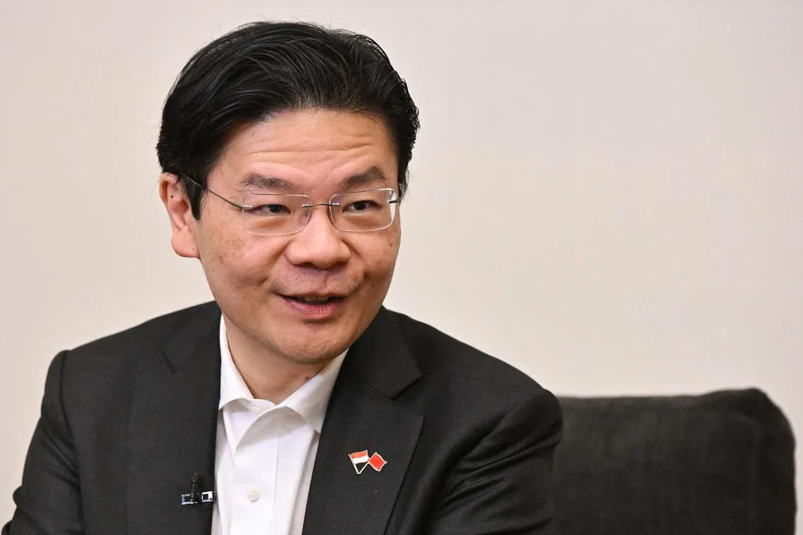 DPM Lawrence Wong speaking during media doorstop in Beijing on Dec 8, 2023.