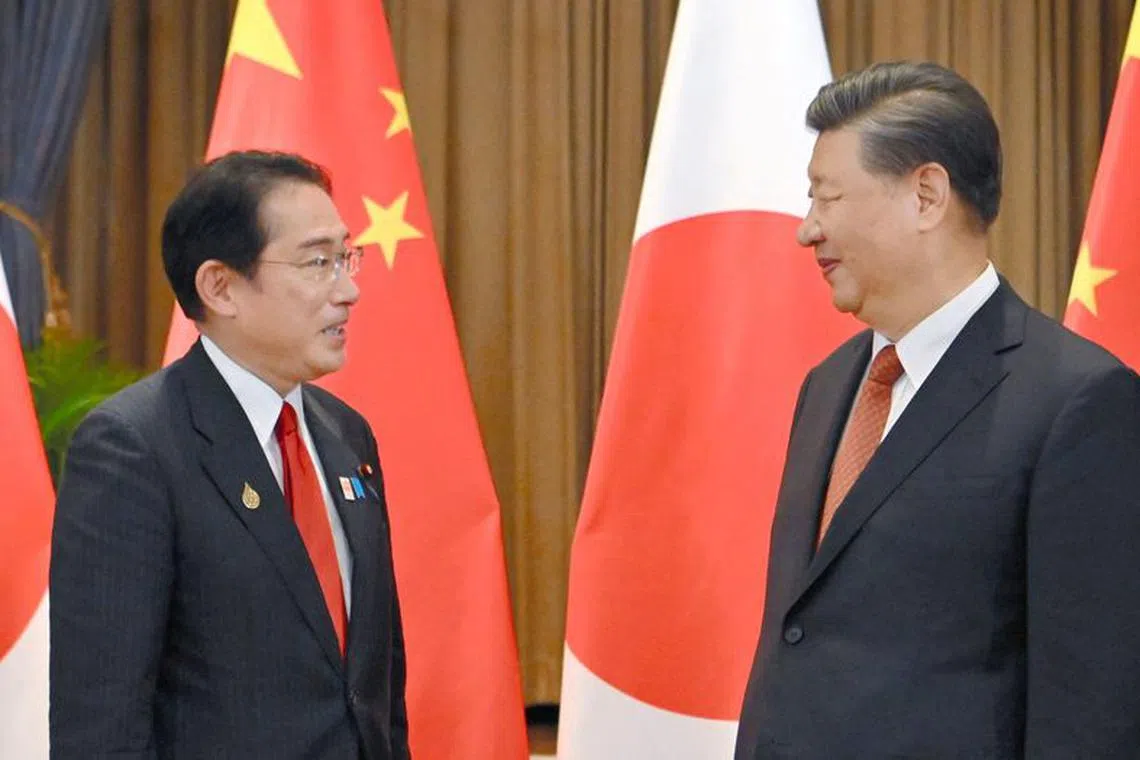 Japanese Prime Minister Fumio Kishida meets Chinese President Xi Jinping on the sidelines of the Asia-Pacific Economic Cooperation (APEC) Summit in Bangkok, Thailand November 17, 2022, in this photo released by Kyodo. Mandatory credit Kyodo via REUTERS/File Photo