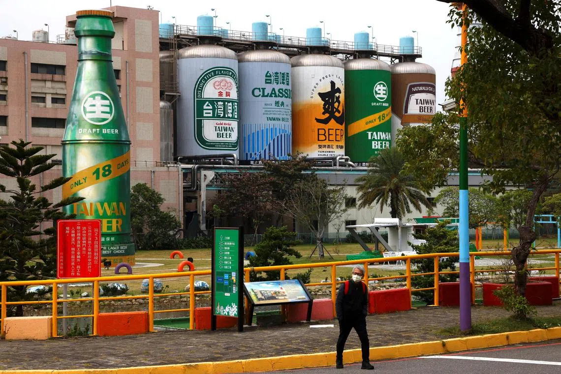A man walks inside the Zhunan brewery belonging to state-owned Taiwan Tobacco and Liquor Corp,  whose products are included in a new round of import ban announced by China, in Miaoli, Taiwan, December 13, 2022. REUTERS/Ann Wang 