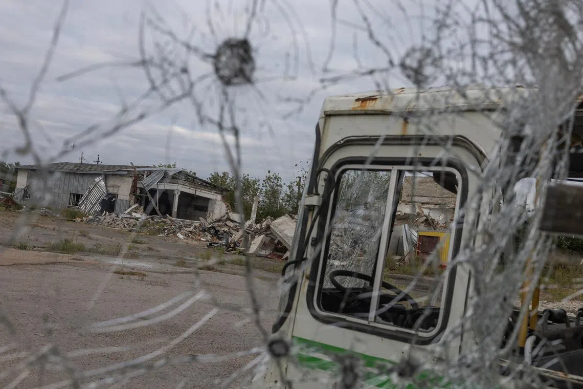 Damaged buses and production facilities are seen at a compound of a local business, which was used by Russian troops during their occupation of the town of Balakliia in the region of Kharkiv, Ukraine September 10, 2023. REUTERS/Valentyn Ogirenko/File photo