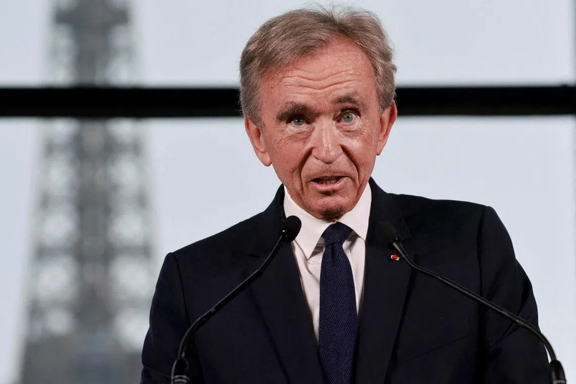 FILE PHOTO: Bernard Arnault, Chairman and Chief Executive Officer of LVMH Moet Hennessy Louis Vuitton, speaks during a press conference to announce a LVMH sponsorship deal for the Paris 2024 Olympic Games at the Grand Palais Ephemere in Paris, France, July 24, 2023. REUTERS/Pascal Rossignol/File Photo
