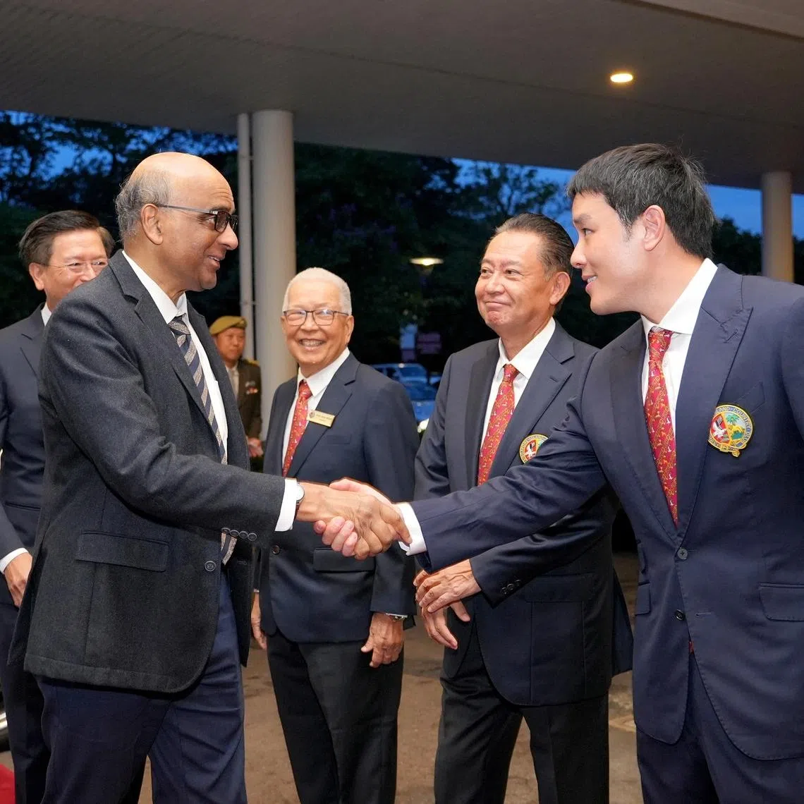 SICC club captain and organising committee chairman Lam Zhiqun (far right) welcomes guest-of-honour President Tharman Shanmugaratnam to the SICC May Day Charity gala dinner at the Grand Island Ballroom. Others in the picture are (from right): SICC chairman Neo Kian Hong, club president Koh Ban Heng and club vice-president Yoshihiro Hirooka.