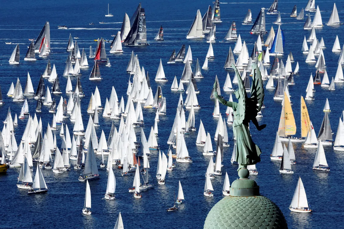 Sailing - The Barcolana, the largest sailing regatta in the world - Trieste, Italy - October 11, 2026 General view as the Victory Lighthouse of Trieste is seen during the Barcolana Sailing Regatta REUTERS/Remo Casilli TPX IMAGES OF THE DAY