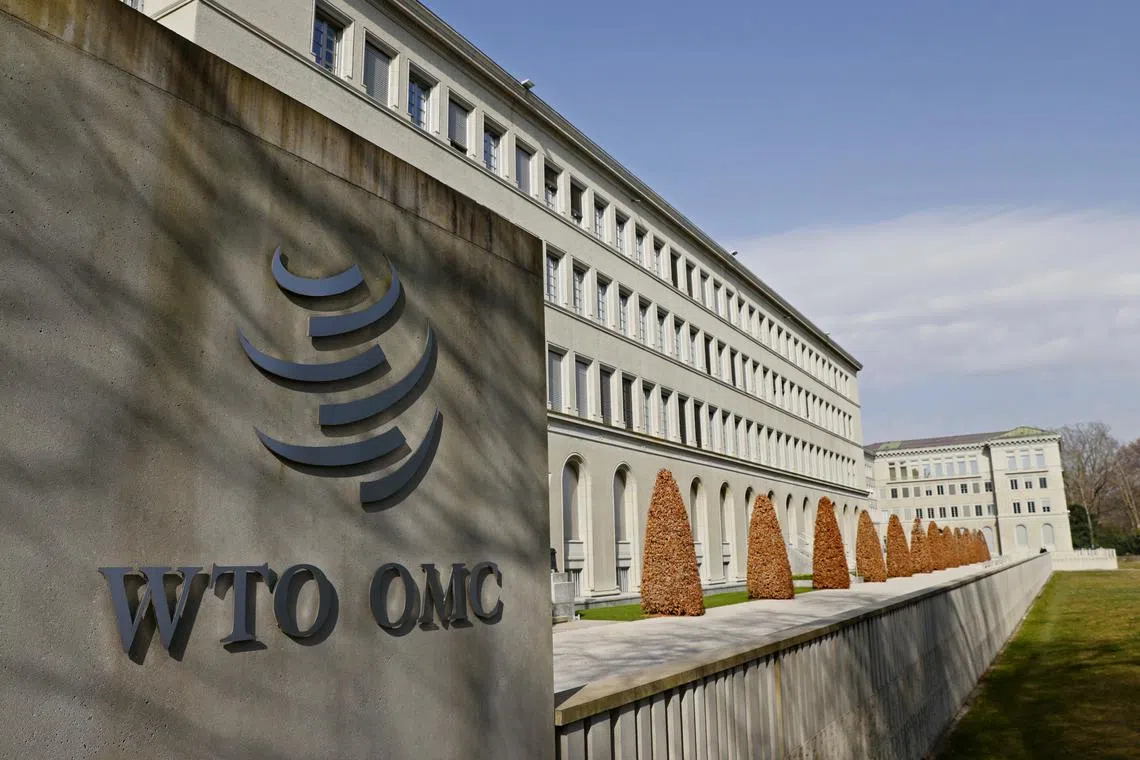 FILE PHOTO: A logo is pictured on the World Trade Organisation headquarters (WTO) in Geneva, Switzerland, March 4, 2021. Picture taken March 4, 2021. REUTERS/Denis Balibouse/ File Photo