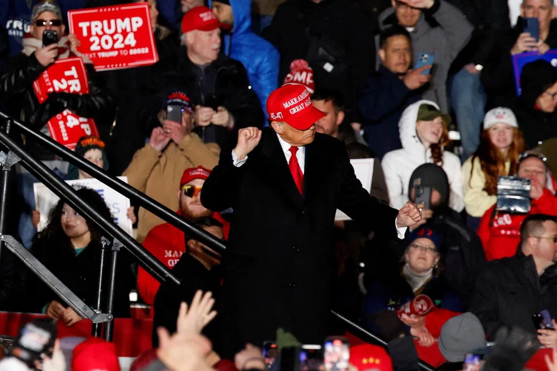 FILE PHOTO: Republican presidential candidate and former U.S. President Donald Trump gestures during a campaign rally in Schnecksville, Pennsylvania, U.S., April 13, 2024. REUTERS/Evelyn Hockstein/File Photo