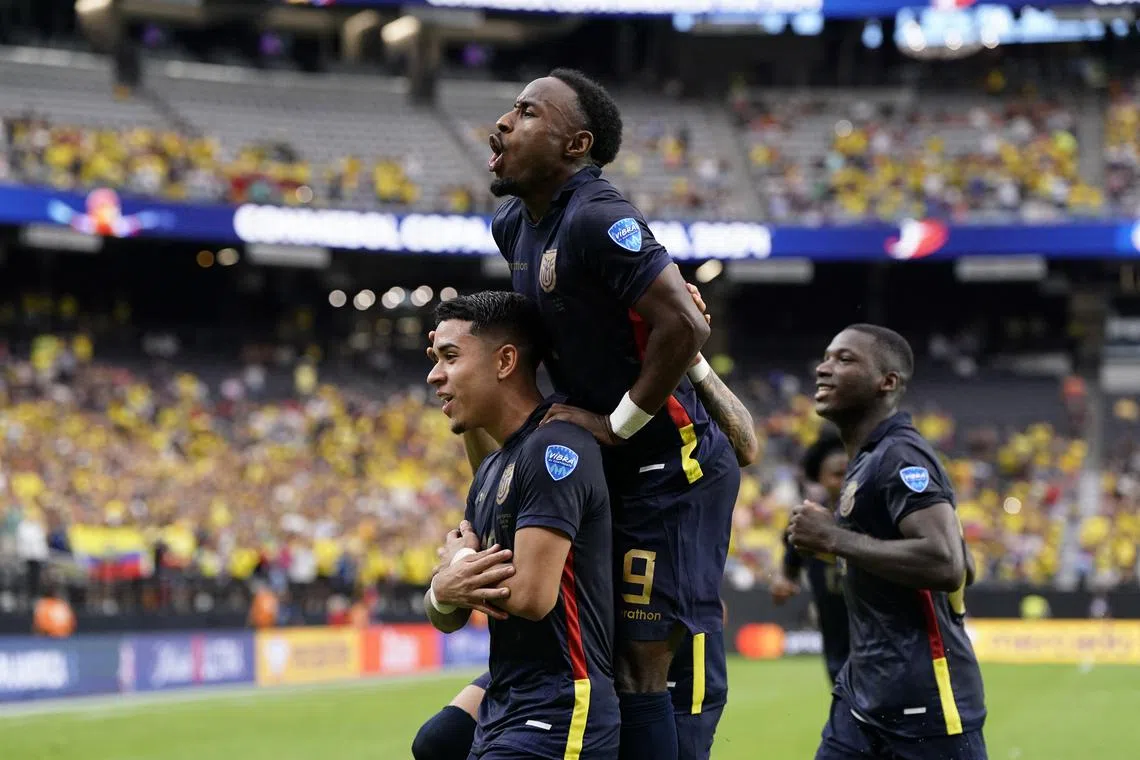 Jun 26, 2024; Las Vegas, NV, USA;  Ecuador midfielder Kendry Paez (10) celebrates with midfielder John Yeboah (9) after scoring a penalty goal against Jamaica during the first half of a Copa America match at Allegiant Stadium. Mandatory Credit: Lucas Peltier-USA TODAY Sports