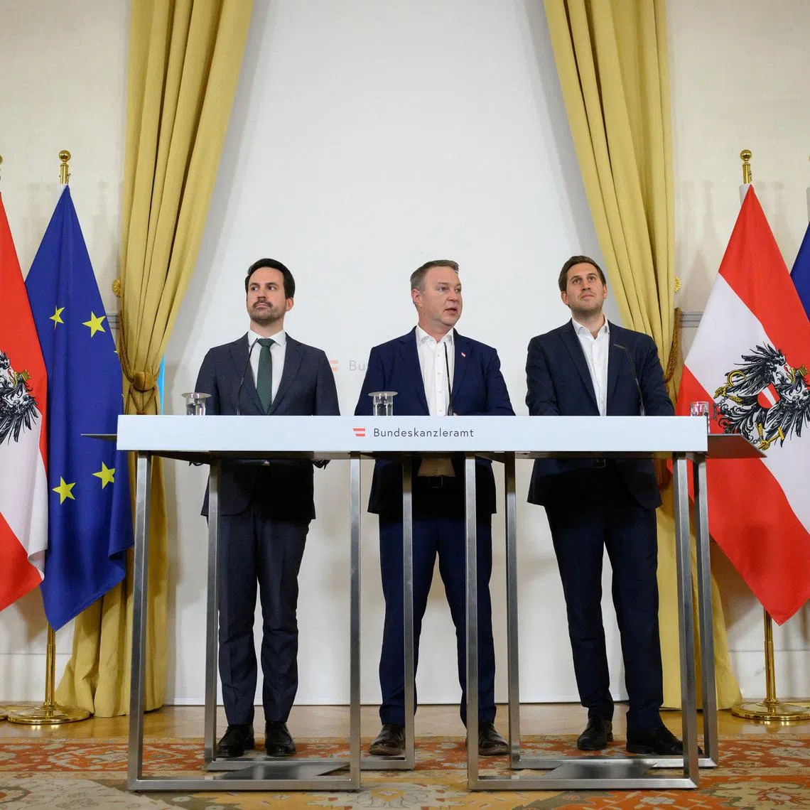 Vice Chancellor Andreas Babler of the Social Democrats, Secretary of State for Digitalization Alexander Proell of the People’s Party and Minister of Education Christoph Wiederkehr of the Neos hold a press conference on plans to ban social media for children under 14 years of age in Vienna, Austria, March 27, 2026. REUTERS/Elisabeth Mandl