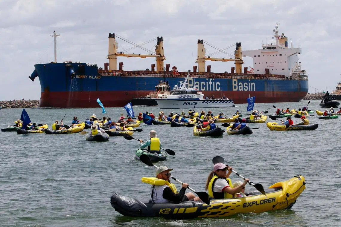 Protesters taking part in the Rising Tide People’s Blockade at Horseshoe Beach in Newcastle on Nov 30. 