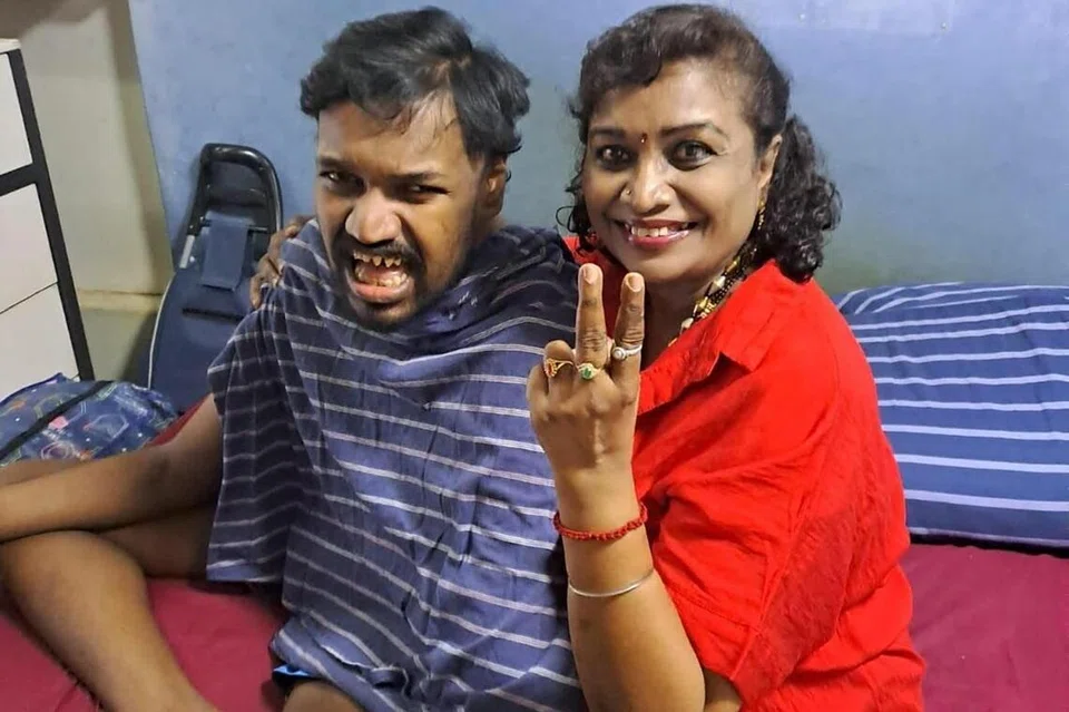 Ms Porchelvi with her son Janarthan.