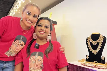 Ms Amutha Kulasekaran (right) with her friend Ganga Uthiansoorian, who helps her identify the jewels she works with.