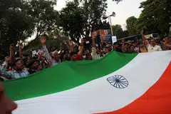 Protesters chant slogans as they take part in a flag rally by the Cockroach Janta Party (CJP) seeking the resignation of India's Chief Election Commissioner Gyanesh Kumar, in New Delhi, India, October 16, 2026.